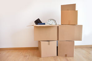 Packed moving boxes with accessories